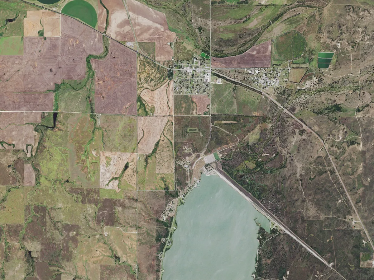 Aerial view of Fort Supply Lake, the town of Fort Supply and the surrounding farm fields in Woodward County, Oklahoma